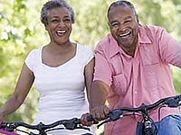 Older couple on bikes